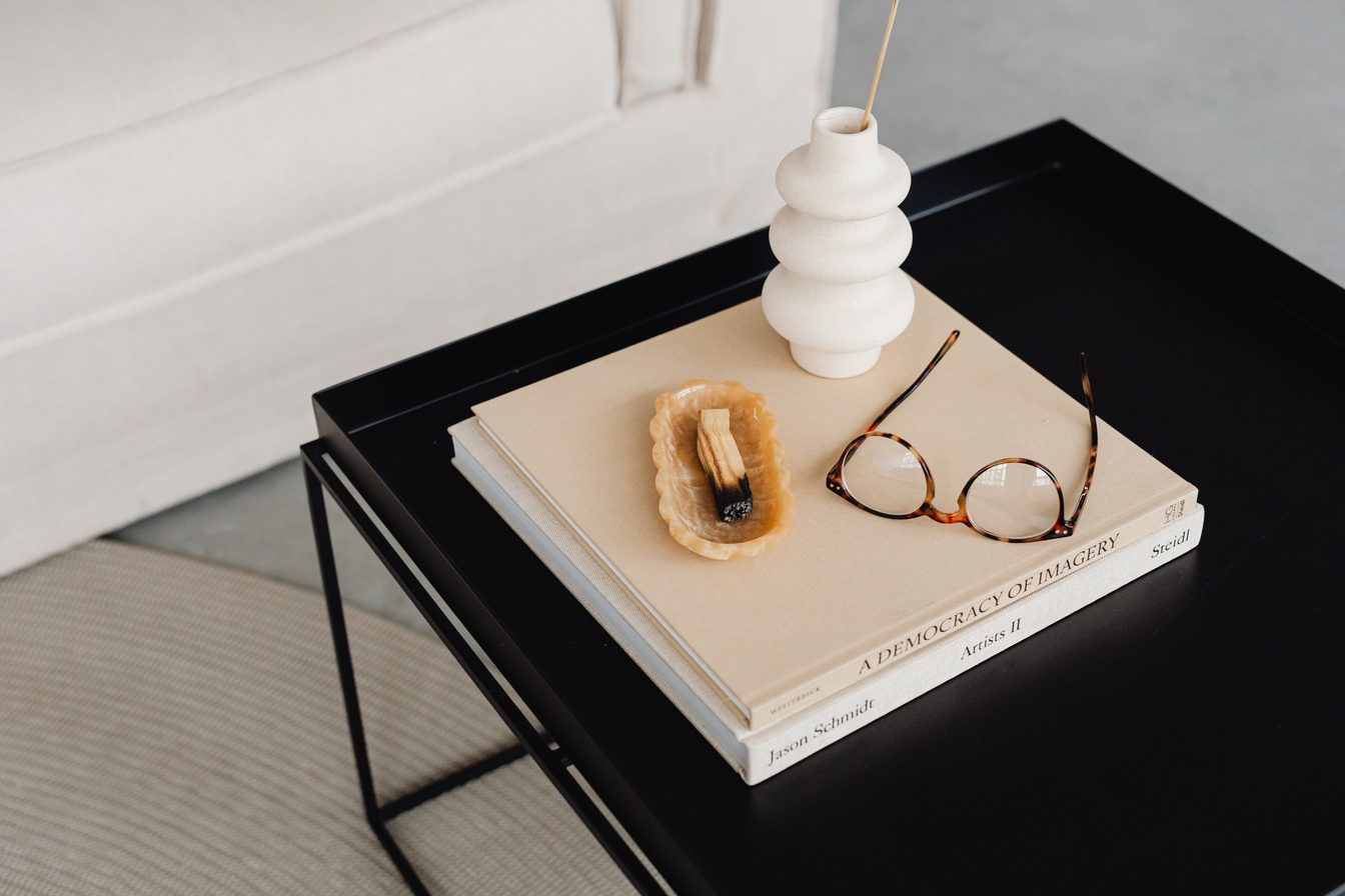 Eyeglasses and Books on a Table